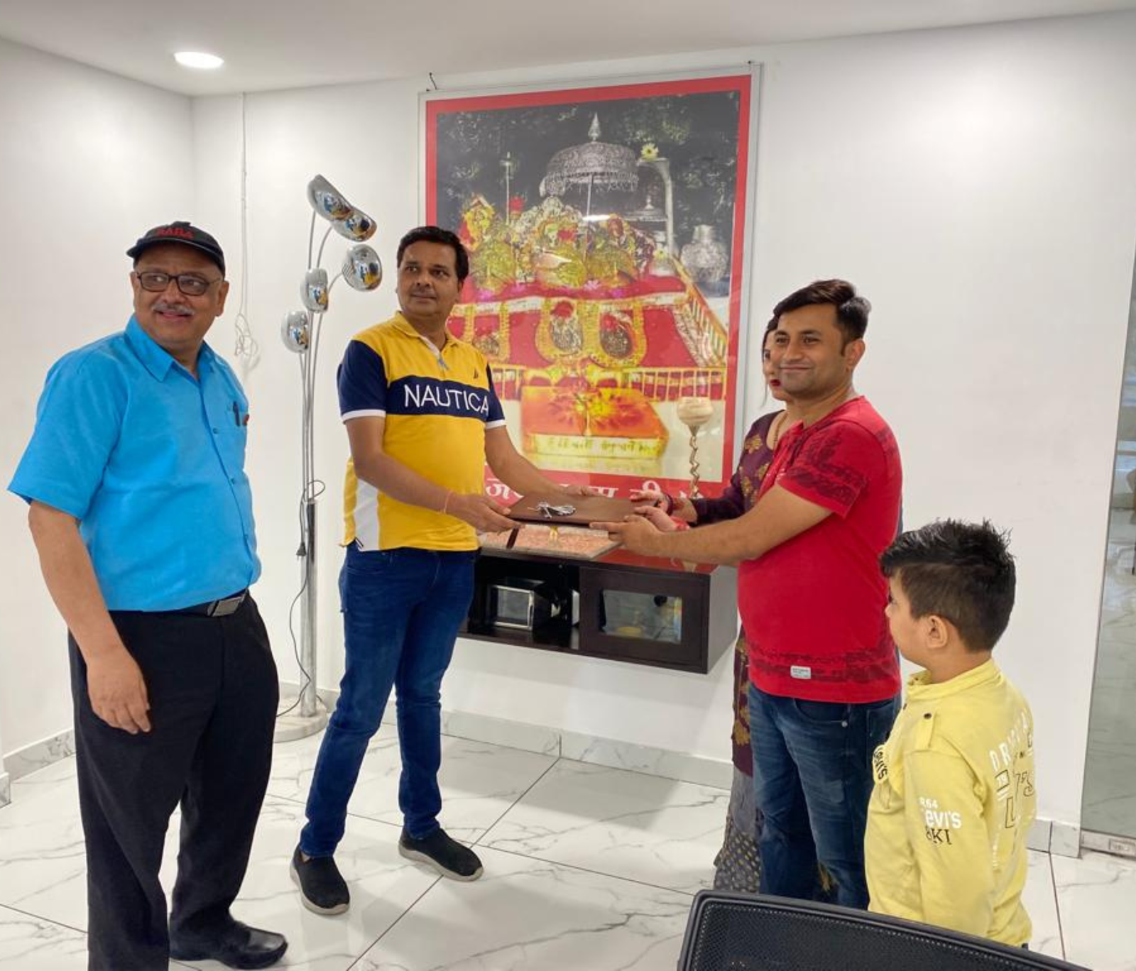 Krissh Greens family receiving their keys